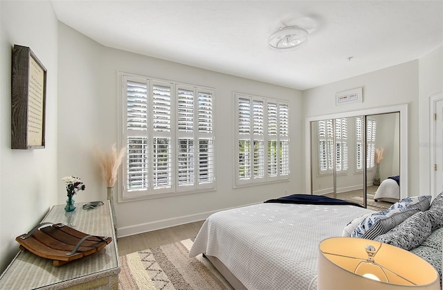 bedroom featuring hardwood / wood-style flooring