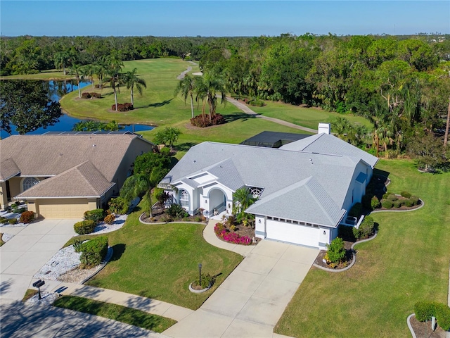 bird's eye view with a water view