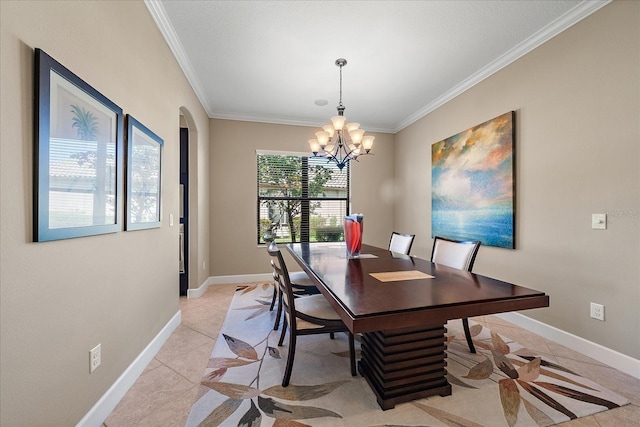 tiled dining space with crown molding and a chandelier