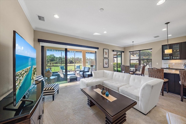 living room with light carpet and crown molding