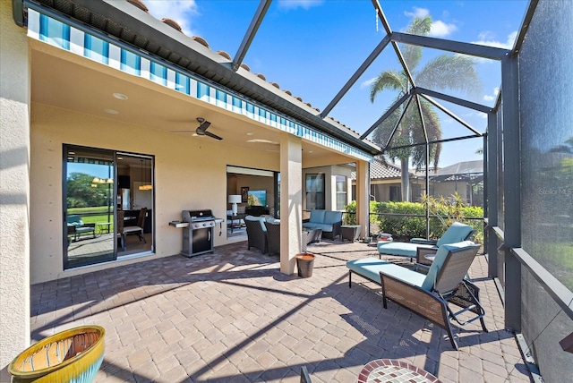 view of patio with ceiling fan, a grill, a lanai, and an outdoor hangout area