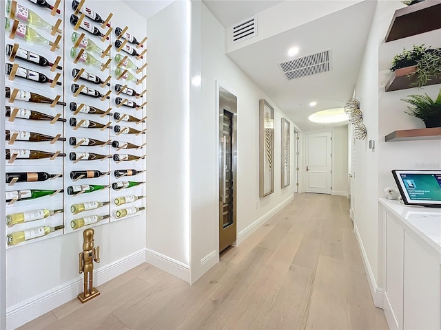 hall featuring light hardwood / wood-style floors