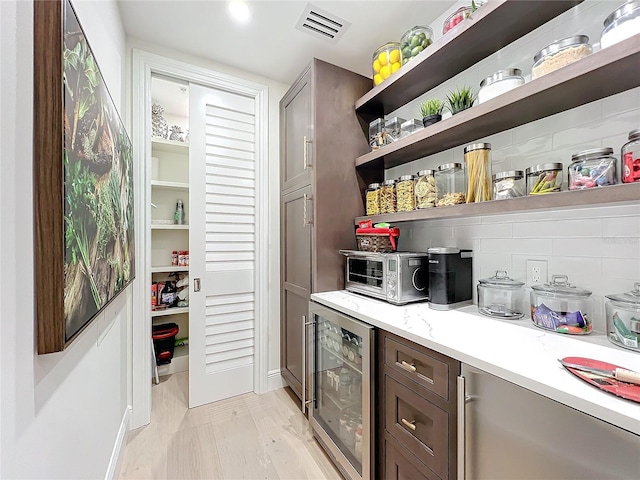 pantry with wine cooler