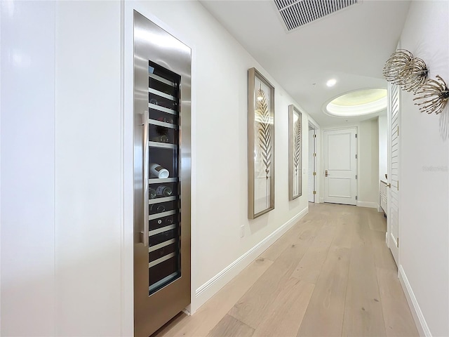 corridor featuring light hardwood / wood-style floors