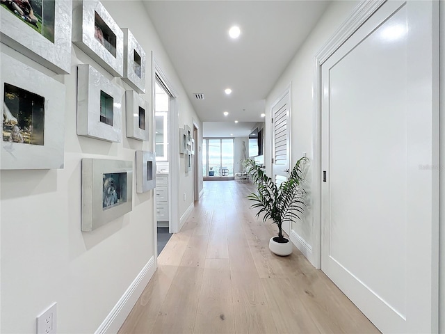 hall featuring light wood-type flooring