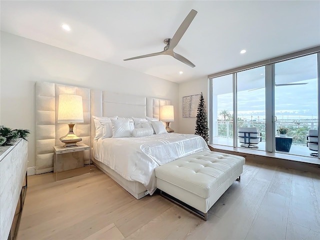 bedroom featuring ceiling fan and light wood-type flooring