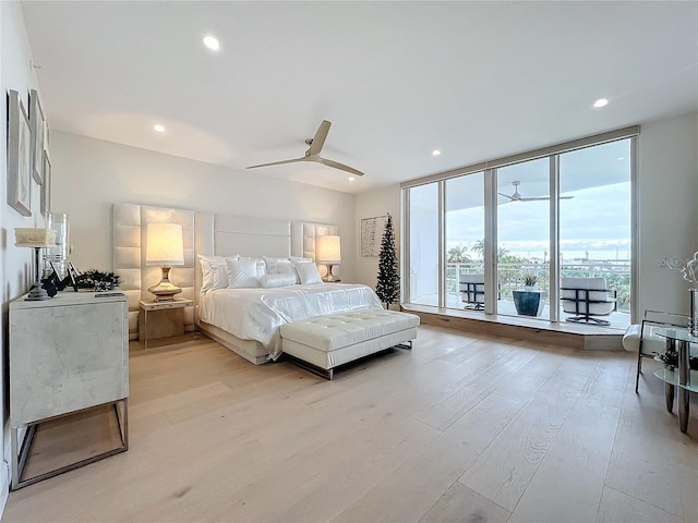 bedroom featuring light wood-type flooring and ceiling fan