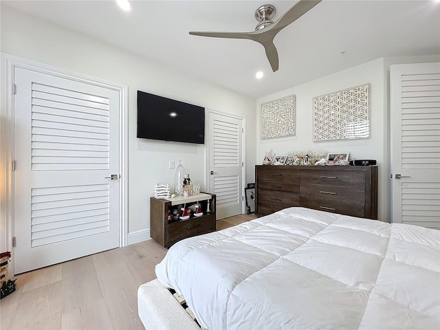 bedroom featuring light hardwood / wood-style flooring and ceiling fan