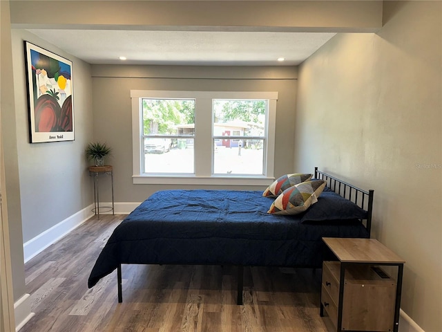 bedroom with wood-type flooring