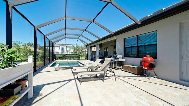 view of patio with a lanai and an outdoor hot tub