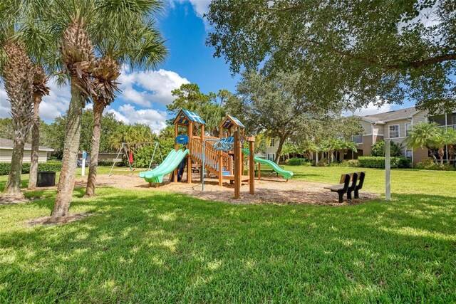 view of playground featuring a yard