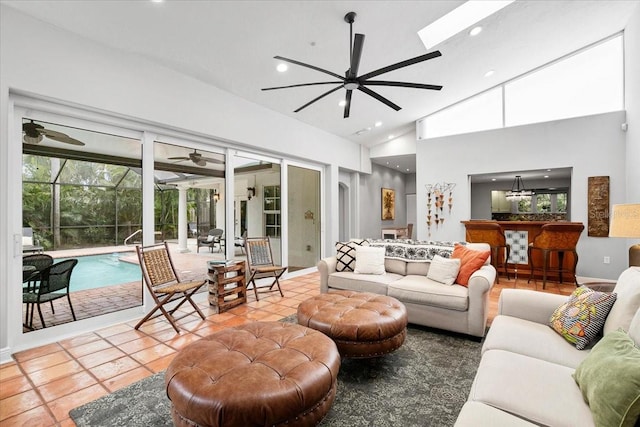 living room featuring tile patterned flooring and high vaulted ceiling