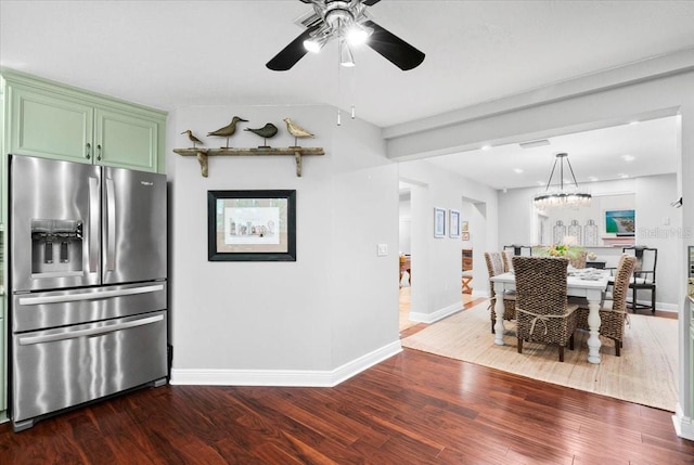 kitchen with pendant lighting, wood-type flooring, stainless steel fridge with ice dispenser, green cabinetry, and ceiling fan