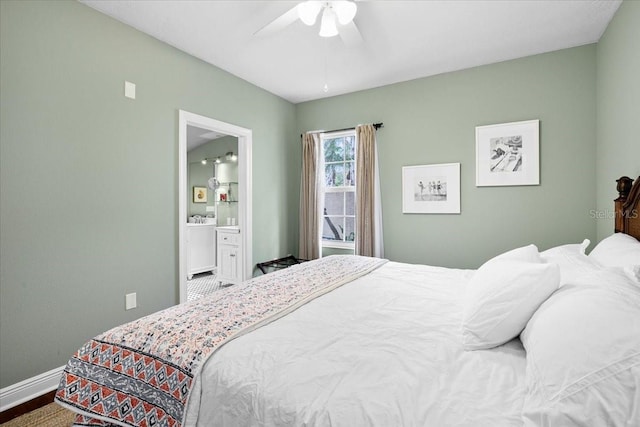 bedroom with ceiling fan, connected bathroom, and hardwood / wood-style flooring