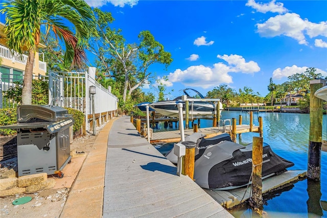 view of dock with a water view