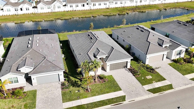 aerial view featuring a water view