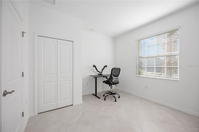 home office featuring light tile patterned floors