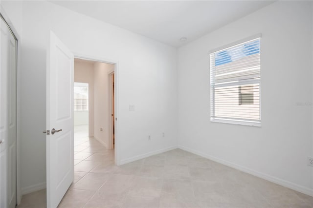 view of tiled spare room