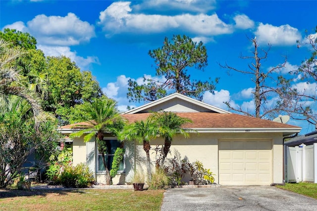 ranch-style home with a garage