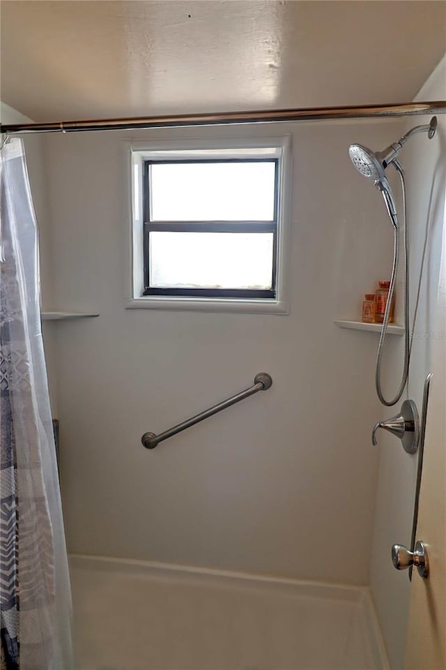 bathroom with walk in shower