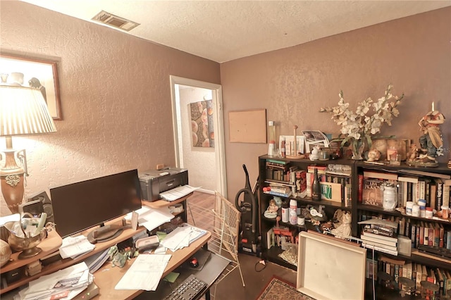 office featuring a textured ceiling