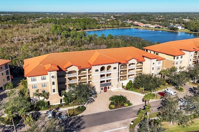 birds eye view of property featuring a water view