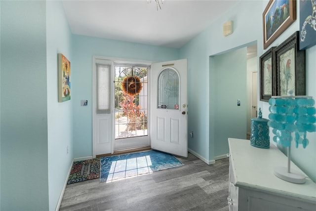 doorway with light hardwood / wood-style flooring