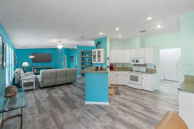 kitchen with white appliances, light hardwood / wood-style floors, white cabinetry, and ceiling fan