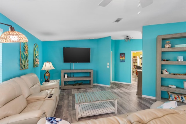 living room with dark hardwood / wood-style floors