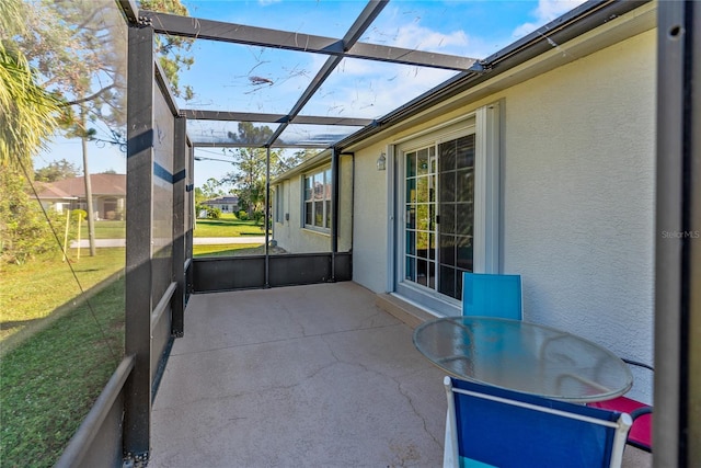 unfurnished sunroom featuring plenty of natural light