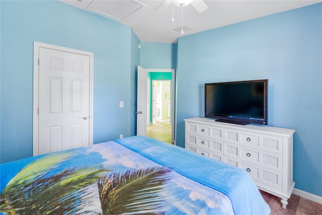 bedroom with hardwood / wood-style flooring and ceiling fan