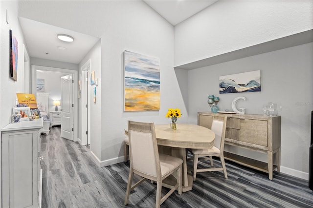 dining area featuring hardwood / wood-style floors