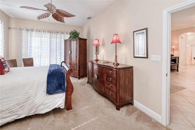 bedroom with light colored carpet and ceiling fan