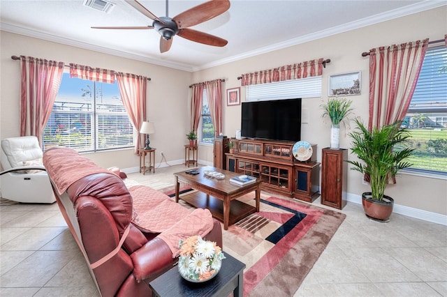 tiled living room featuring a wealth of natural light, crown molding, and ceiling fan