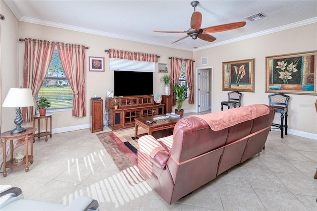 tiled living room with a textured ceiling, ceiling fan, and ornamental molding