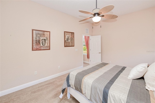 bedroom featuring ceiling fan and light colored carpet