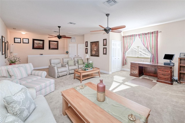 living room featuring light carpet