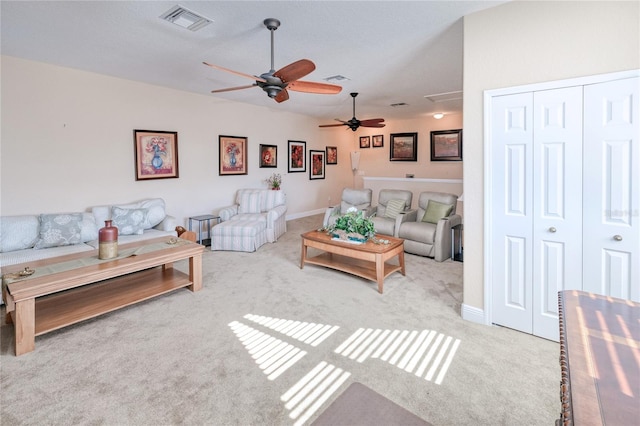 living room featuring ceiling fan and light colored carpet