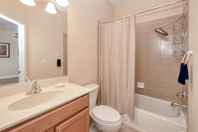 full bathroom featuring shower / tub combo, vanity, and toilet