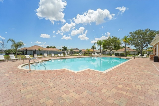 view of pool featuring a patio area