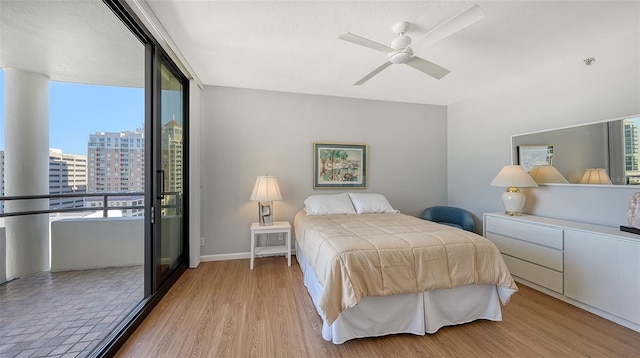 bedroom with access to outside, multiple windows, ceiling fan, and light hardwood / wood-style floors