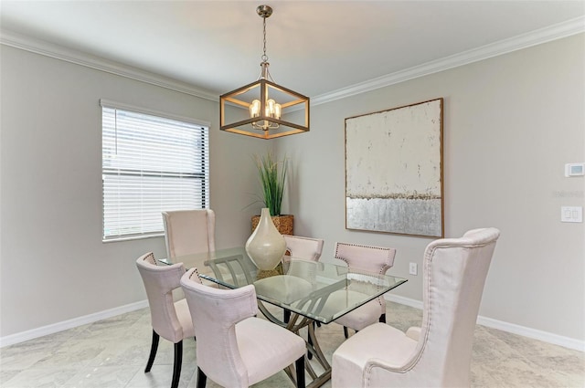 dining area featuring a chandelier and ornamental molding