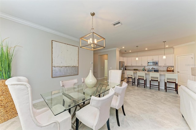 tiled dining space with crown molding and a notable chandelier