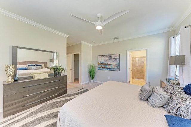 bedroom featuring ensuite bathroom, ceiling fan, crown molding, and light carpet