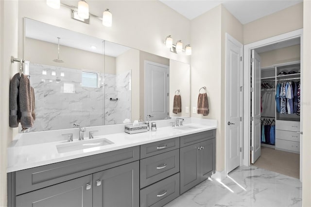 bathroom featuring vanity and a tile shower