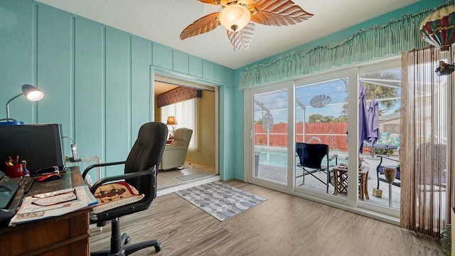 office area featuring ceiling fan and light wood-type flooring