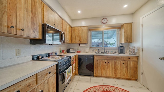 kitchen with light tile patterned floors, backsplash, stainless steel appliances, and sink