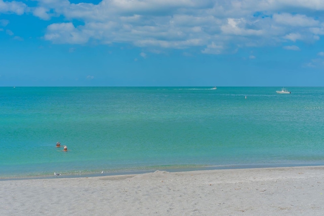 property view of water with a beach view