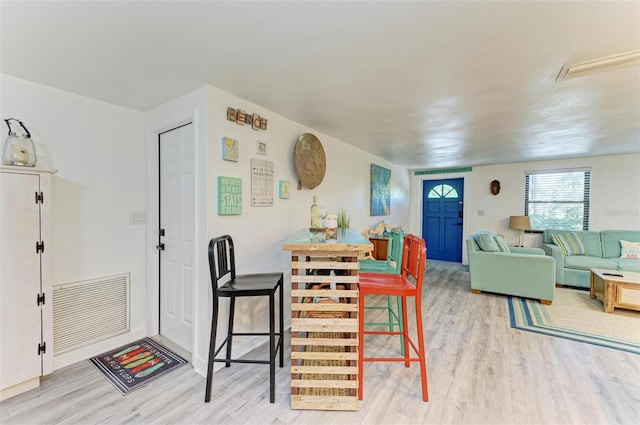 dining area featuring hardwood / wood-style floors