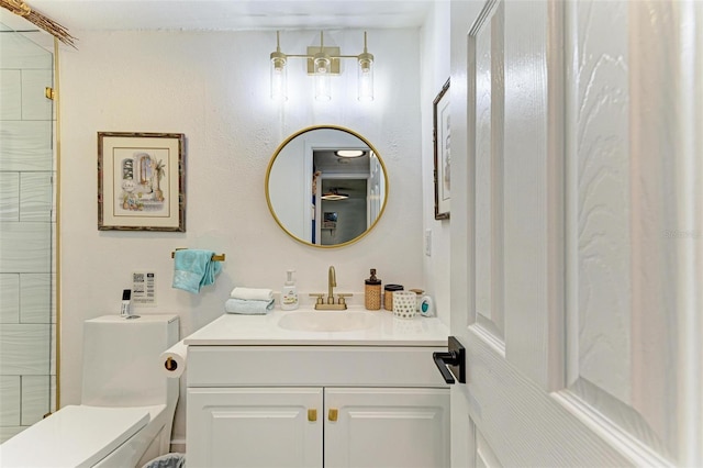 bathroom with vanity and toilet